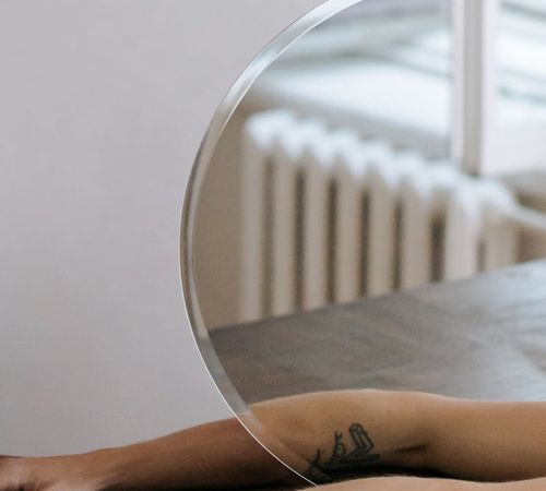 Close-up of hands in a meditative position.