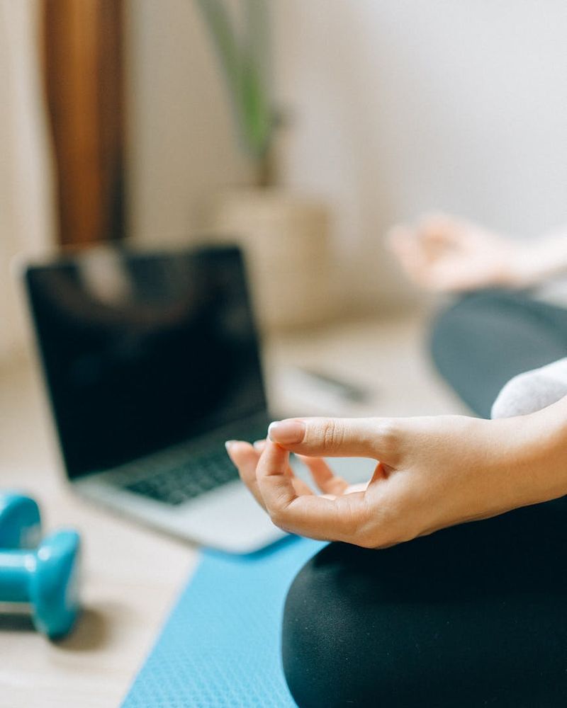 Spacious, calm room with a yoga mat on the floor.